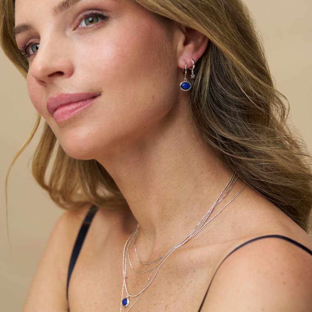 Huggie Hoop Petite Star Charm Huggie Hoop Earrings - Silver Orelia Jewellery