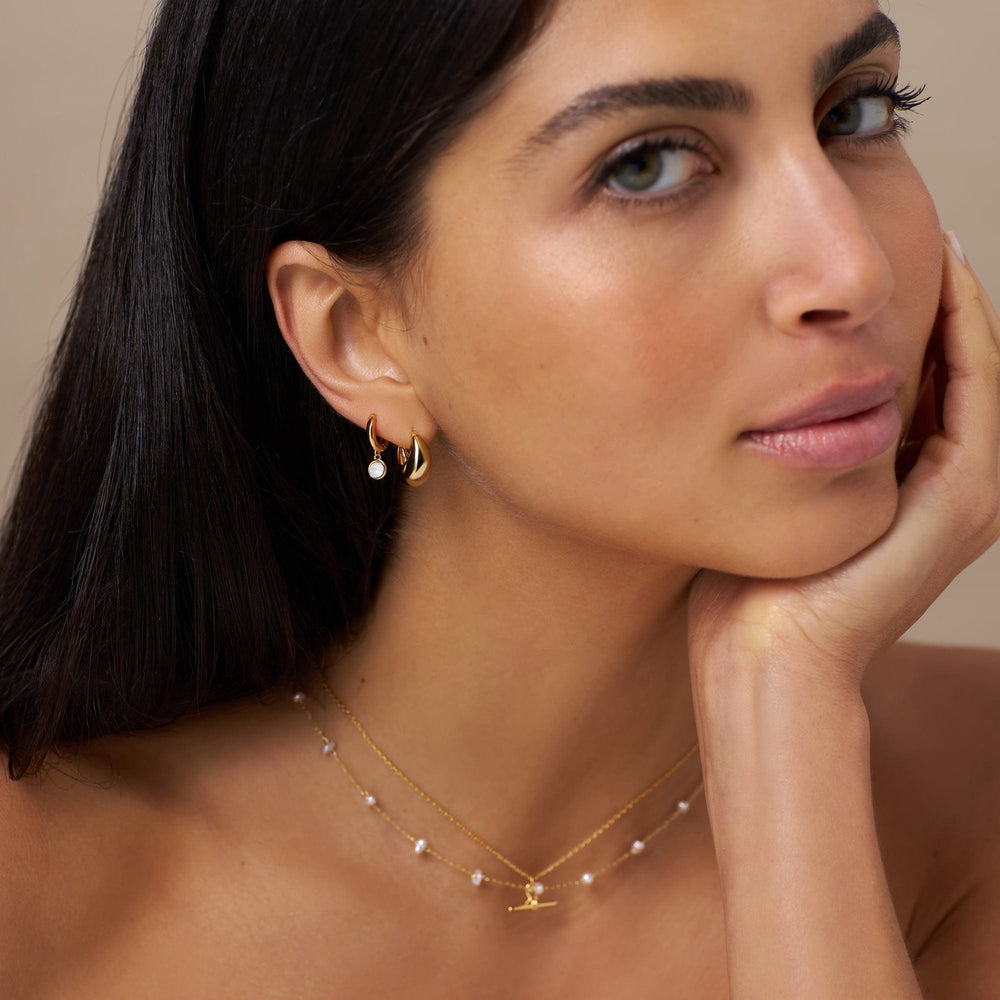 Huggie Hoops White Opal Drop Huggie Hoop Earrings Made With Swarovski® Crystals - Gold Orelia Jewellery